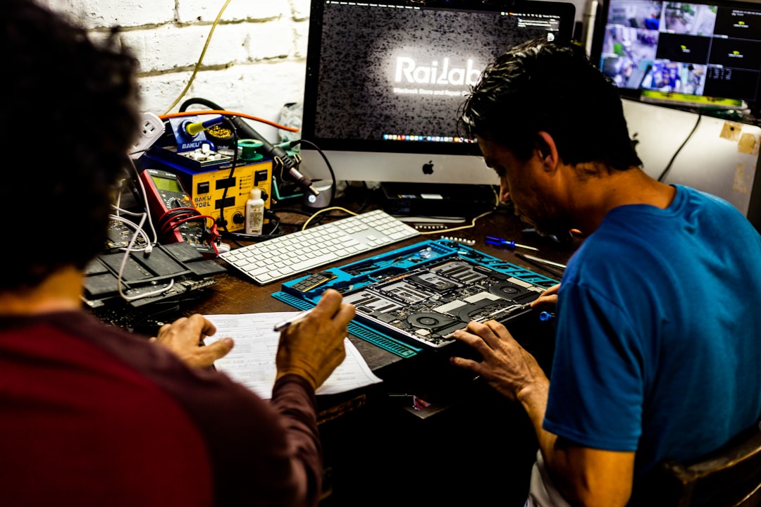 Assembly line worker building smart pet products in our Hefei factory